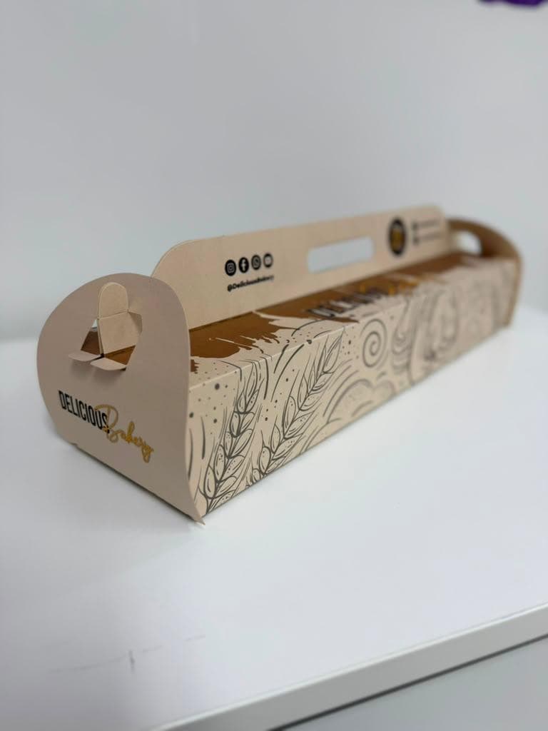 A kraft bakery carry box with wheat line art