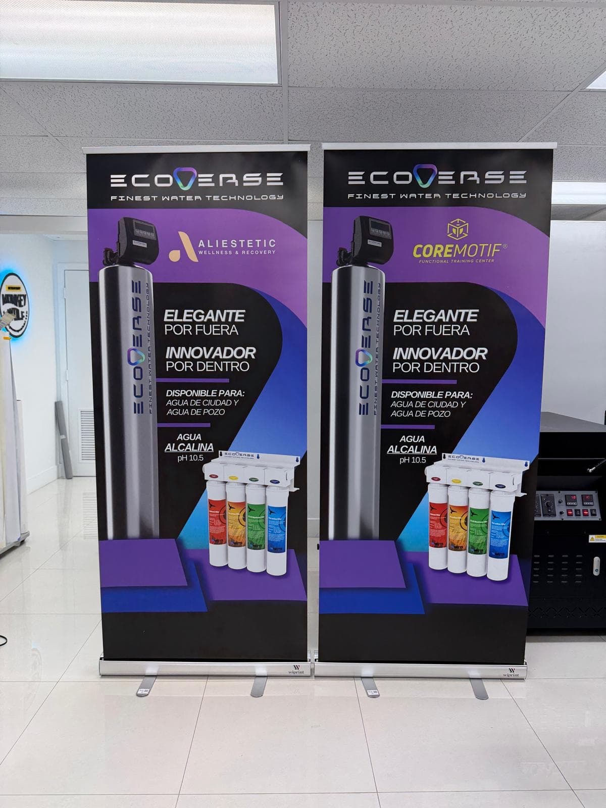 Two ECOVERSE retractable banner stands